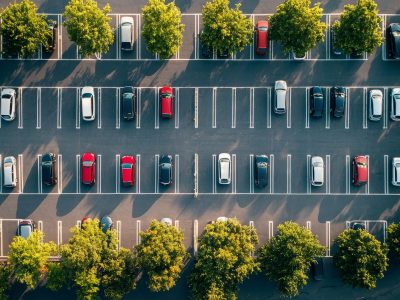 Open car parking lot viewed from above, aerial top view